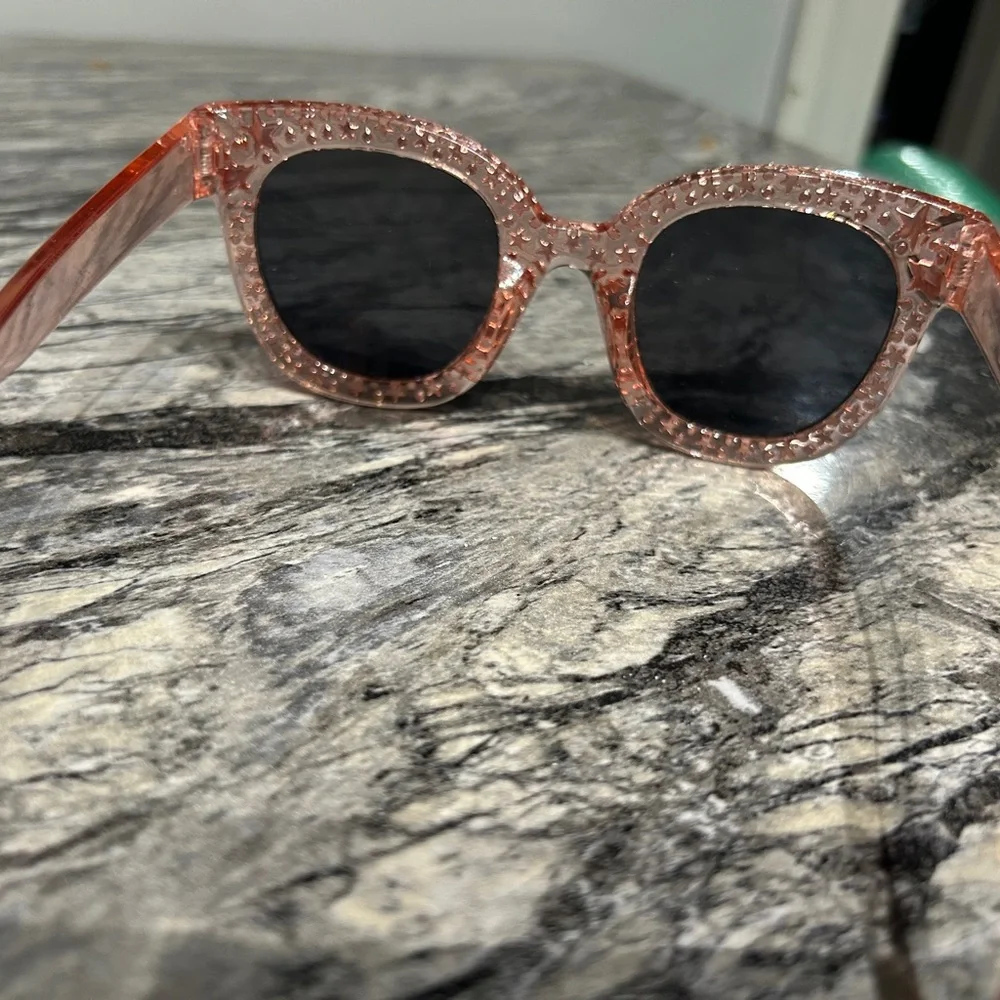 Stylish Pink Sunglasses with Star Accents